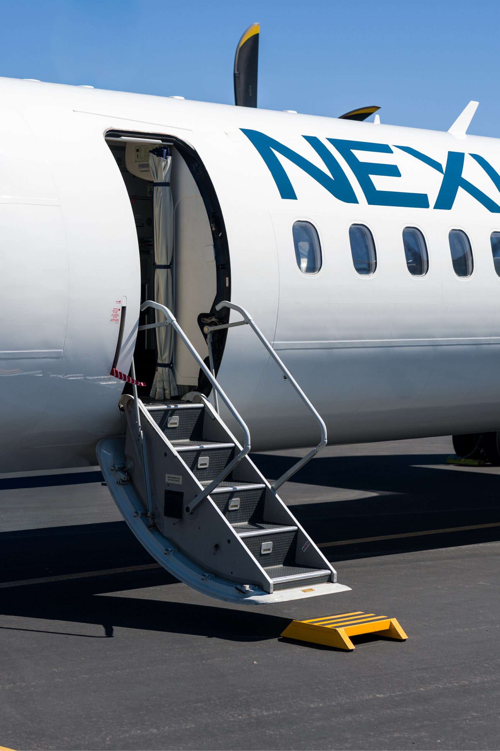 Passenger boarding aircraft using airstairs