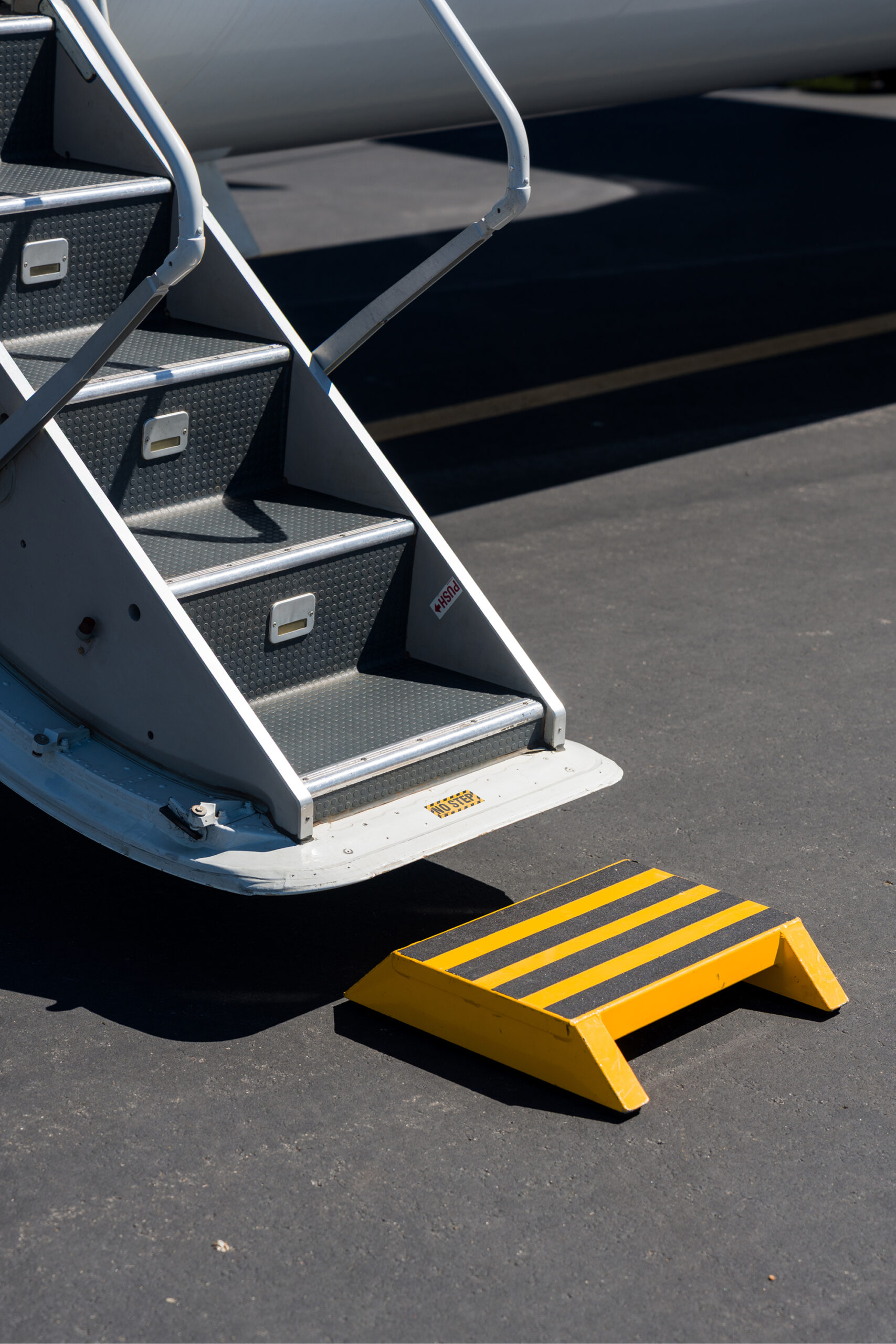 Ground crew providing boarding assistance